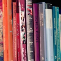 Photo by Karolina Grabowska www.kaboompics.comVibrant array of books on a shelf showcasing diverse titles and colors.