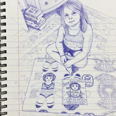 Ink drawing of a girl sitting cross-legged on the floor with paper dolls and a “Rag Darlings” kit in front of her; books and a dresser are in the background. Drawn on lined notebook paper, the scene captures a nostalgic moment—perhaps she’s confirming a Feedsack Quilt design to match her playful creations.