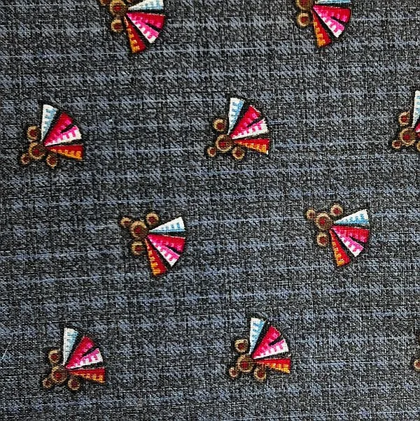 Gray fabric with a repeating pattern of small, colorful, stylized fans in red, pink, white, and blue—shades reminiscent of Turkey Red Dye history—each paired with three brown circles, evenly spaced across the surface.