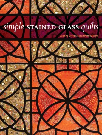 Book cover titled Simple Stained Glass Quilts with an orange and gold quilt design featuring circular and geometric stained-glass patterns. Authors: Daphne Greig & Susan Purney Mark.