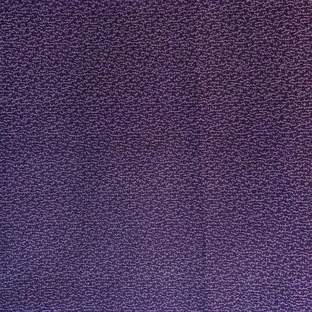 A close-up of Telltale Textiles: Double Purple fabric reveals a small, intricate wavy pattern covering the entire surface. The purple textured fabric appears to have a subtle sheen and a slightly uneven texture.