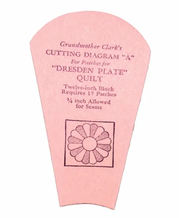 Grandmother-Clarks-cardboard-template-dresden-plate Pink paper template labeled Grandmother Clarks Cutting Diagram A for Dresden Plate quilt, with flower pattern illustration and instructions for cutting twelve-inch quilt blocks.