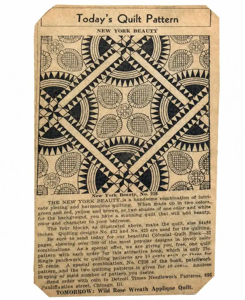 New York Beauty Laura Wheeler A vintage newspaper clipping of a quilt pattern called New York Beauty, featuring a geometric, circular black and white patchwork design with floral motifs and detailed instructions—a striking example of Depression Era Quilts.