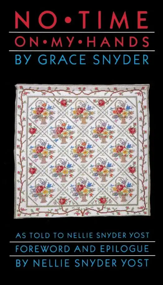 Book cover for No Time on My Hands by Grace Snyder shows a detailed, colorful quilt with floral and basket patterns. Title and author names are in red and blue text on a black background.