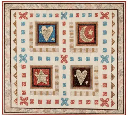 A digitally printed quilt with four central squares, each featuring a heart or star adorned with words like joyful, love, gratitude, and peace. The quilt is beautifully decorated in red, blue, and tan patterns.