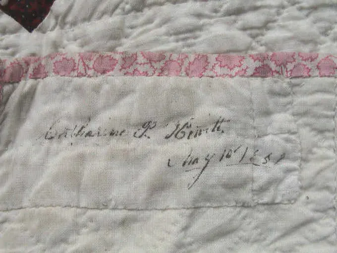 Ink inscription on the 1852 album quilt reading Catharine P. Hewitt, May 1852